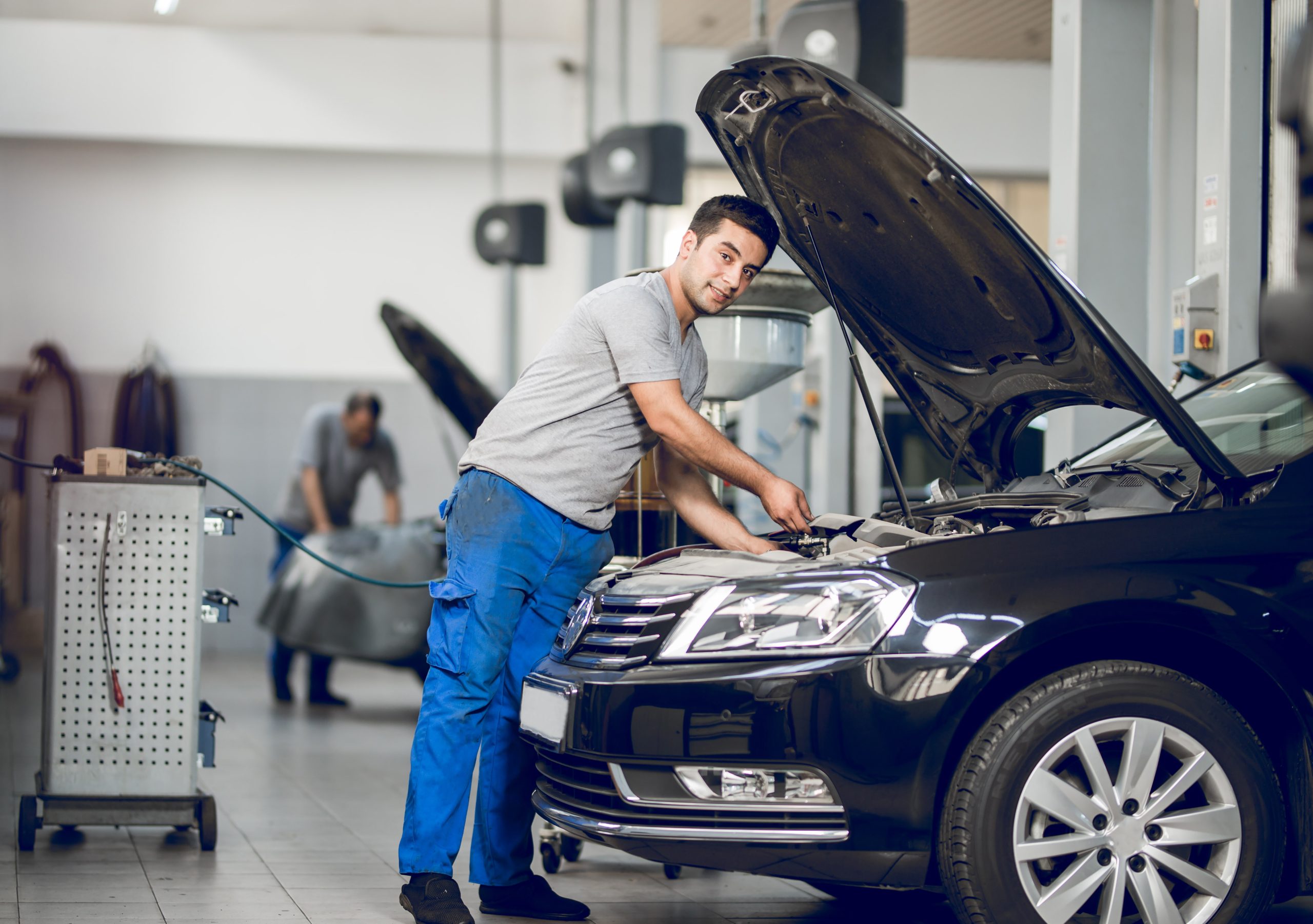 benchman fixing engine car